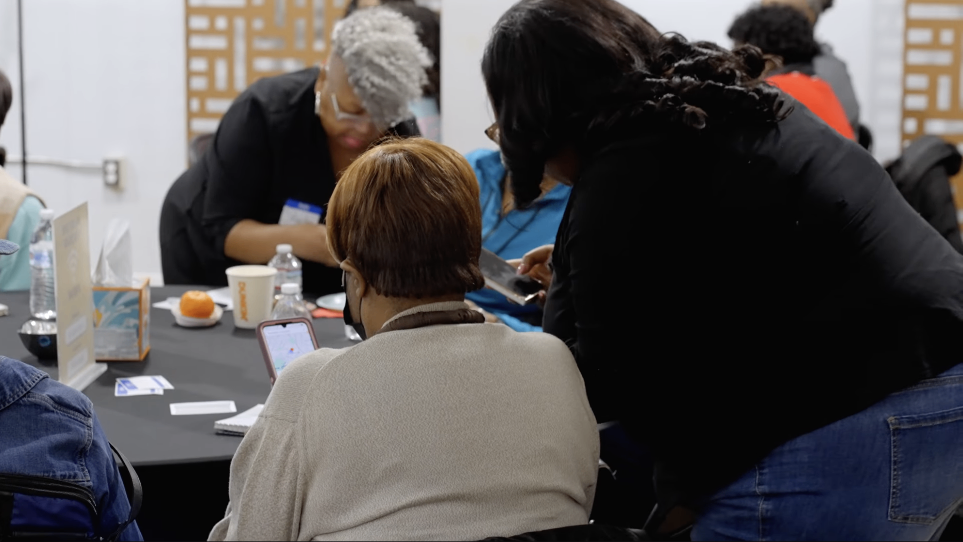 Older adults receiving one-on-one hands-on phone help
